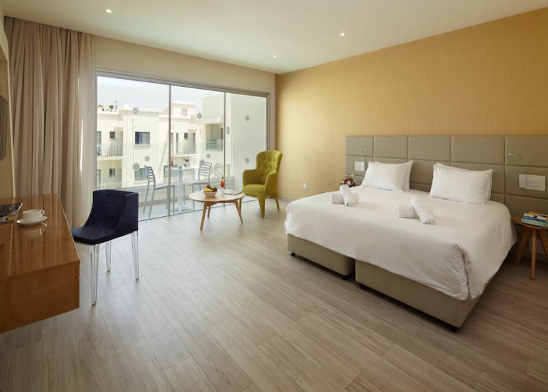 MELPO ANTIA HOTEL & SUITES HOTEL